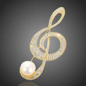 brošňa husľový kľúč s pravou perlou pozlátená