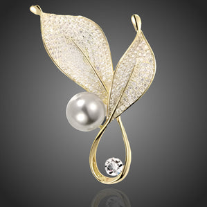 brošňa lístok s krištáľovou perlou pozlátená