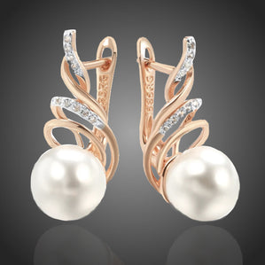 náušnice s perlou a zirkonmi bizuteria