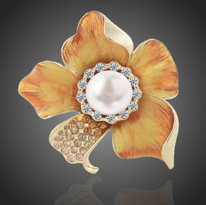 brošňa oranžový kvet s perlou